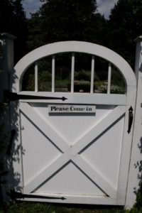 A friendly gate leading into the herb garden