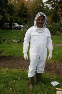 Carlos in his bee garb - he finds learning about my colonies fascinating.