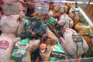 Wonderful ducks, chickens, and other poultry - many sold with feet still intact