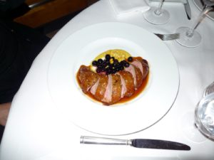 The carved breast of roasted duck