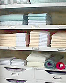 Showing how to organize a linen closet. (OAD: 11/6/1997)