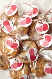 And last, but not least, is 'Make and Give.'  These beautifully packaged Valentine gifts are chocolate chunk-cherry cookies.  You can make the lovely cherry tag labels using clip art from marthastewart.com.
