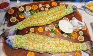 Every Easter, I always serve salmon from True North, one of my favorite sources for fish. These were filleted and then poached and then reconstructed without the bones. The fish were decorated with cucumber slices and served with cucumber sauce. http://www.truenorthseafood.com