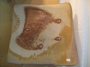 This large square platter is by Jody Johnsone - http://www.jodyjohnstonepottery.com/index.html - Jody became interested in pottery in her early twenties living and working in Japan.