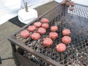 The burgers grilling