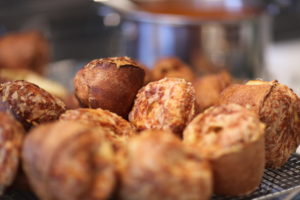 The popovers were baked with a sprinkling of grated gruyere cheese.