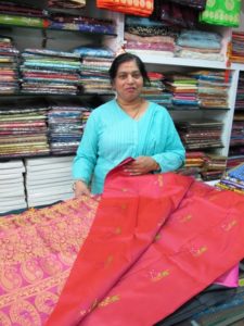 This woman was happy to show us some of her gorgeous saris.