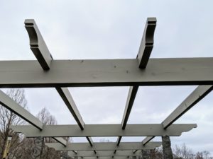 It takes some time to clean every single beam on this pergola, but it is well worth the effort. All my pergolas and outbuildings are painted in my signature Bedford Gray.