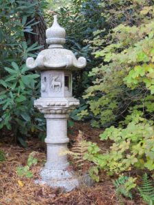One of several ancient stone lanterns tucked in among the plantings