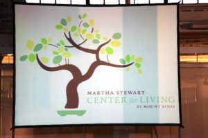 The logo for the Center for Living - a bonsai tree