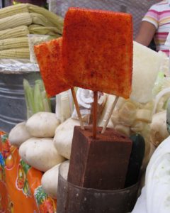 These are jicama 'pops' dusted with chili powder.