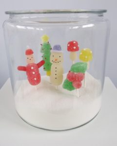 A Lolly, Jolly Christmas from 2008 - Make these pops by sliding gumdrops onto sticks and then arrange the sweet creations in a sugary, wintry showpiece.