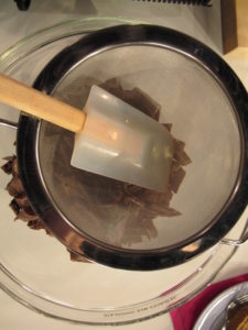 Chopped milk chocolate is placed in a bowl for melting.