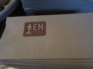 Napkins with En's Japanese Brasserie's logo