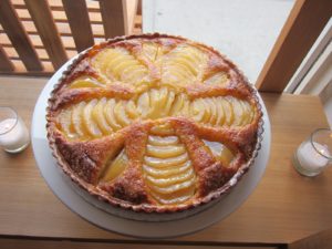 Poached pear and almond tart