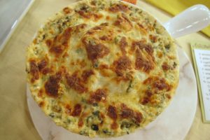 Delicious Artichoke-Spinach Dip - the combination of part-skim ricotta and mozzarella cheeses replaces the sour cream in original recipes resulting in the same creamy texture but less saturated fat.