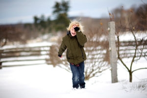 Harper getting walloped by a snowball - all in good fun.  Photo credit:  Raymond Haddad http://www.flickr.com/photos/raymondhaddad/