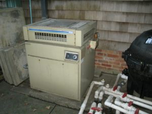 This is the old pool heater, which hasn't worked in many years.  It will eventually be replaced with a new high efficiency heater, also by Weil McLain.  Stay tuned for the heat exchanger upgrade next spring.