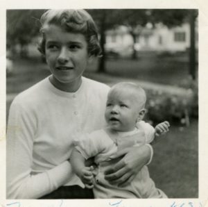 This photo was taken in 1955, the year Laura was born.  Here I am at age 13 holding her.