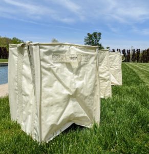 These Multi-Purpose Tote Bags are not only great for collecting the grass clippings and weeds while gardening, but they're also very handy for storing towels, toys, and other supplies inside and outside the home. And, they're completely reusable and waterproof.