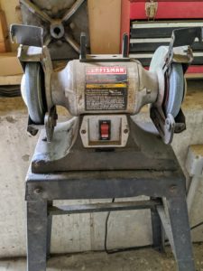 At the back of my large Equipment Barn, we have all kinds of tools and supplies for maintaining all the vehicles at the farm. This is a bench grinder.