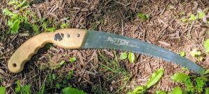 He uses a 13-inch hand pruning saw with razor-sharp, impulse hardened teeth.