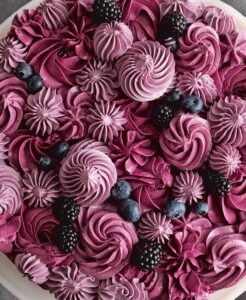 It's hard to resist our Berry Layer Cake - look at all the gorgeous deep colors of the blueberries, black raspberries, blackberries, and varying shades of burgundy frosting. This recipe packs fresh fruits in the dough and sweet black raspberry jam into the meringue buttercream. (Photo by Mike Krautter)