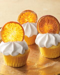 Also in this book - Orange Curd Cupcakes. These cupcakes are filled with delicious citrus flavor. They're made using zest in the batter, curd in the filling and fresh slices of fruit on top. (Photo by Mike Krautter)