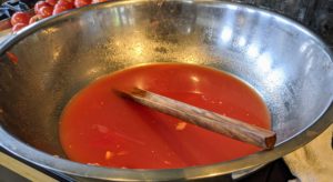 The tomato juice made from fresh, raw tomatoes is a great source of lycopene, which is considered to have cancer preventing and reducing properties. All bowls of seeded tomatoes and tomato juice were stored in the refrigerator overnight. The next step is the canning process.