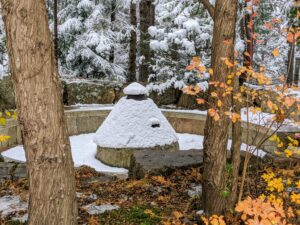 This is the Jens Jensen designed council circle and fire pit, where in the summer, we roast marshmallows and tell ghost stories. Fortunately, the fire pit is already well covered for the season.
