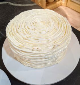 Here it is all finished - a carrot cake dressed up in ruffles - simple yet elegant, and so delicious.