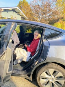 Here is Cate leaving my house with her new family. Roz has her on her lap. I’m told that Cate did very well traveling and is behaving herself quite nicely. It is always very rewarding when a puppy goes to a good home where they will be safe and happy. Breeders take great pride in making sure all the dogs go to safe and good homes.