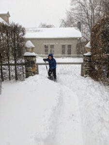 Phurba shovels behind my Winter House - the snowfall kept everyone busy.