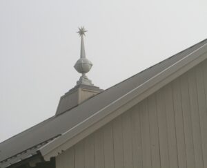 This is one of three lead-coated copper finials that sit atop the Equipment Barn. In winter, these can be seen clearly from across the paddocks.