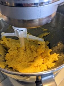 Then I creamed the butter and sugar. Technically, creaming means mixing butter and sugar together on a moderately high speed until well blended, fluffy and pale yellow.