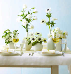 When entertaining, gather assorted glass bottles and vases and give the insides a few coats of white matte spray paint to create a faux porcelain look. They’ll look so beautiful with cut flowers.