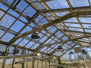 The entire greenhouse is filled with windows. Most of the energy comes from the sun through these giant windows, which can be programmed to open for ventilation or cooling when needed.