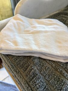 After rinsing, dry immediately with a clean, lint-free towel to prevent spotting.