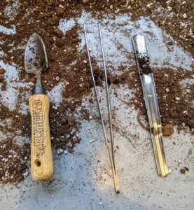 These tools are very useful for transplanting seedlings. A very small shovel, a large pair of tweezers and the tool on the far right is called a widger. It has a convex stainless steel blade that delicately separates the tiny plants - it’s also from Johnny’s Selected Seeds.