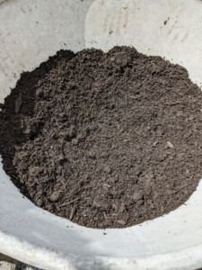 My compost includes dark organic matter made up of manure and biodegradable materials. Compost is ready to use after two years. During this time, it is mixed with water, oxygen, carbon, and nitrogen, which break down the organic material.