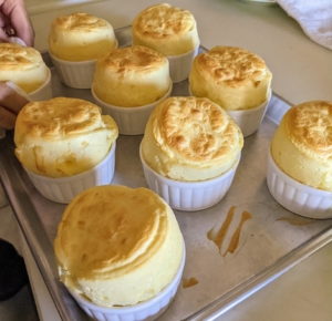 And right on time, these beautiful cheese souffles emerge from the oven perfectly. The photo is quickly taken, so these gorgeous souffles can be served puffed up - the puff does not last long.