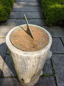 At the end of the footpath is this antique sundial. A sundial is any device that uses the sun’s altitude or azimuth to show the time. It consists of a flat plate, which is the dial, and a gnomon, which casts a shadow onto the dial.