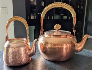 Here are two copper kettles - also newly cleaned and polished.