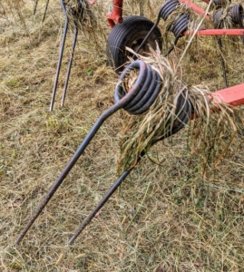 Here is a closer look at the tines, or moving forks, which aerate or “wuffle” the hay and speed up the drying process.