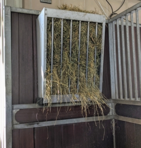 We use these galvanized wall mounted horse feeders in the stalls. They’re from RAMM Horse Fencing & Stalls, a 30-year old family-owned business located in Swanton, Ohio. The feeders hold up to two flakes of hay each.