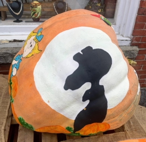 And here, the silhouette of Snoopy, or is it the "Great Pumpkin?" Do you remember the story? Linus believes that on Halloween night the Great Pumpkin rises out of the pumpkin patch and flies all over the world delivering toys to all good children everywhere.