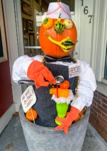Here is a decorated pumpkin chef with gourds used to create the face. This one reminding visitors that restaurants are opened once again.