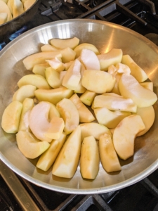 Meanwhile, Chef Pierre works on the dessert. We decided on an apple tart tatin using a combination of fresh apples from my trees. The apples are peeled, quartered, and cooked down with sugar until they are amber brown in color.