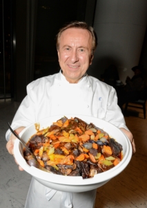 Here is Chef Daniel with a large platter of Beef Bourguignon - one of Julia's specialties. Beef Bourguignon is a beef stew braised in red wine, often red Burgundy, and beef stock, typically flavored with carrots, onions, garlic, and a bouquet garni, and garnished with pearl onions, mushrooms, and bacon. (Photo by Madison McGaw/BFA.com)