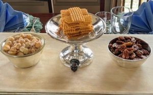 One of my guests brought some delicious cheese crackers and Macadamia nuts. On the right, a bowl of roasted pecans.